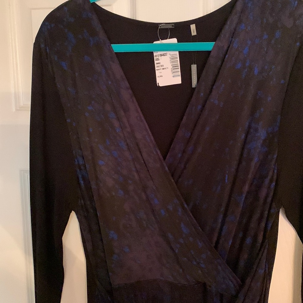Beautiful and flattering this Eli Tahari dress retails for $379 new with tags